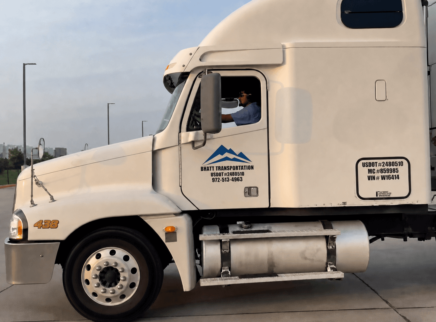 A Bhatt Transportation driver at the wheel of a company tractor in Coppell, Texas